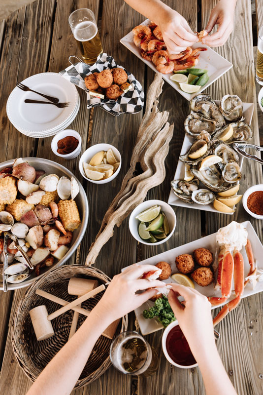Not everyone can afford to eat out every night on vacation and that's totally fine! Plan out which restaurants you want to visit when you're on the Outer Banks then cook the rest of the time. 