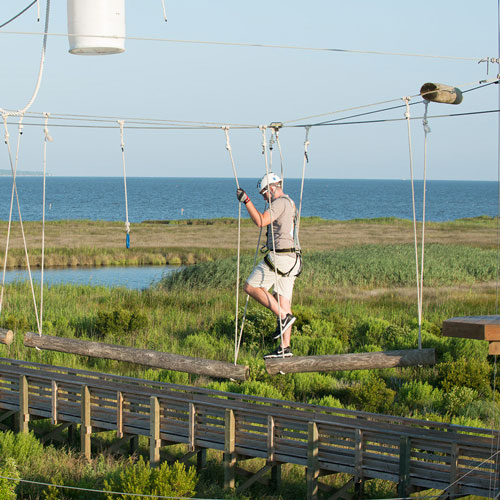 Hit the First Flight Adventure Park on the Outer Banks for family fun and thrills. 