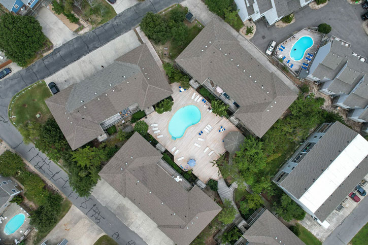 This aerial view of the Indian Summer Condos in Corolla show the Indian Summer Units right beside the community pool. 
