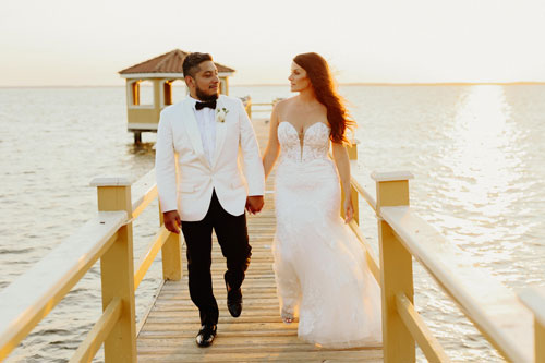 Outer Banks even homes are perfect for weddings! Photography by Sarah D'Ambra.